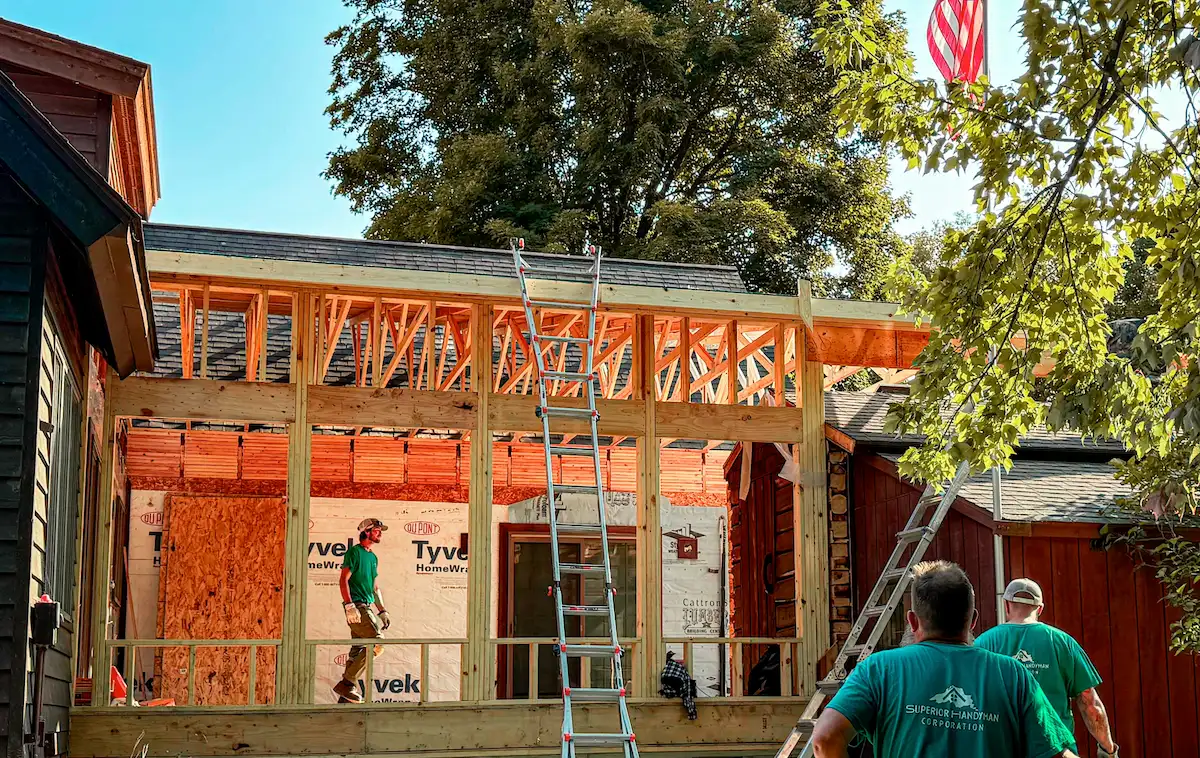 Superior Building Solutions crew framing a custom home in Marquette, Michigan